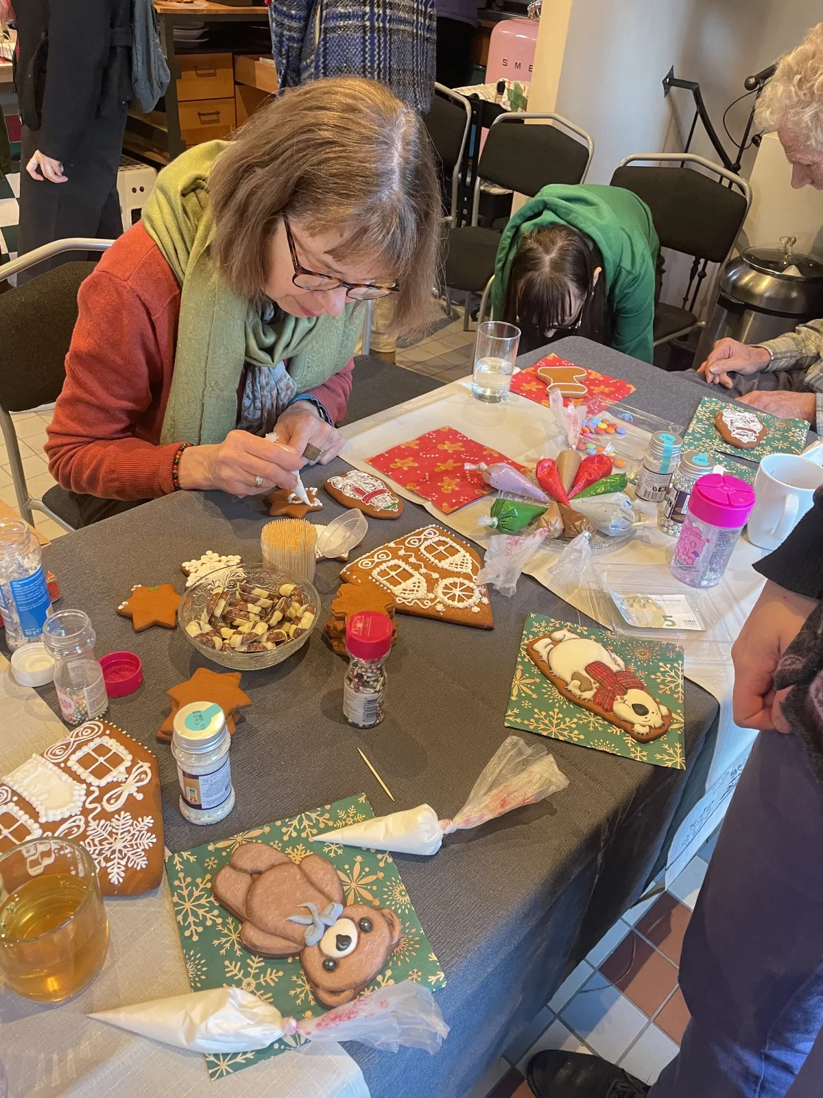 Participants decorating cookies together
