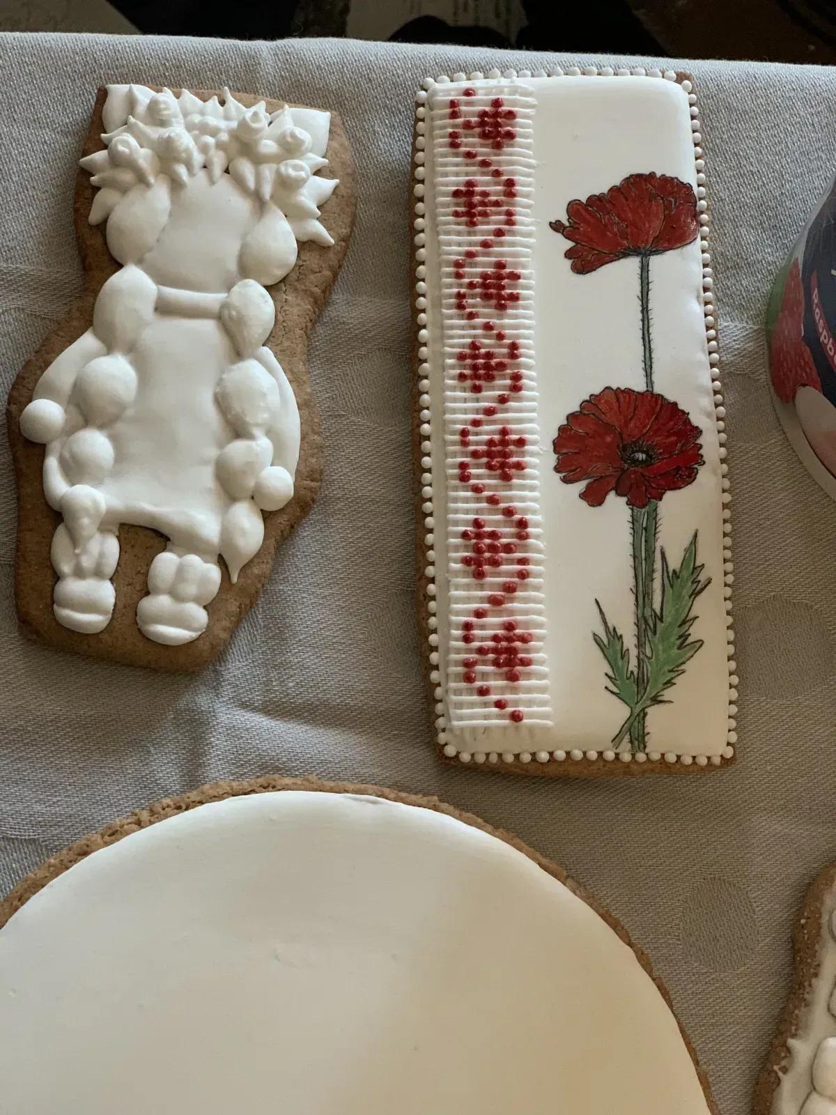 Cookie with vyshyvanka embroidery pattern and poppies