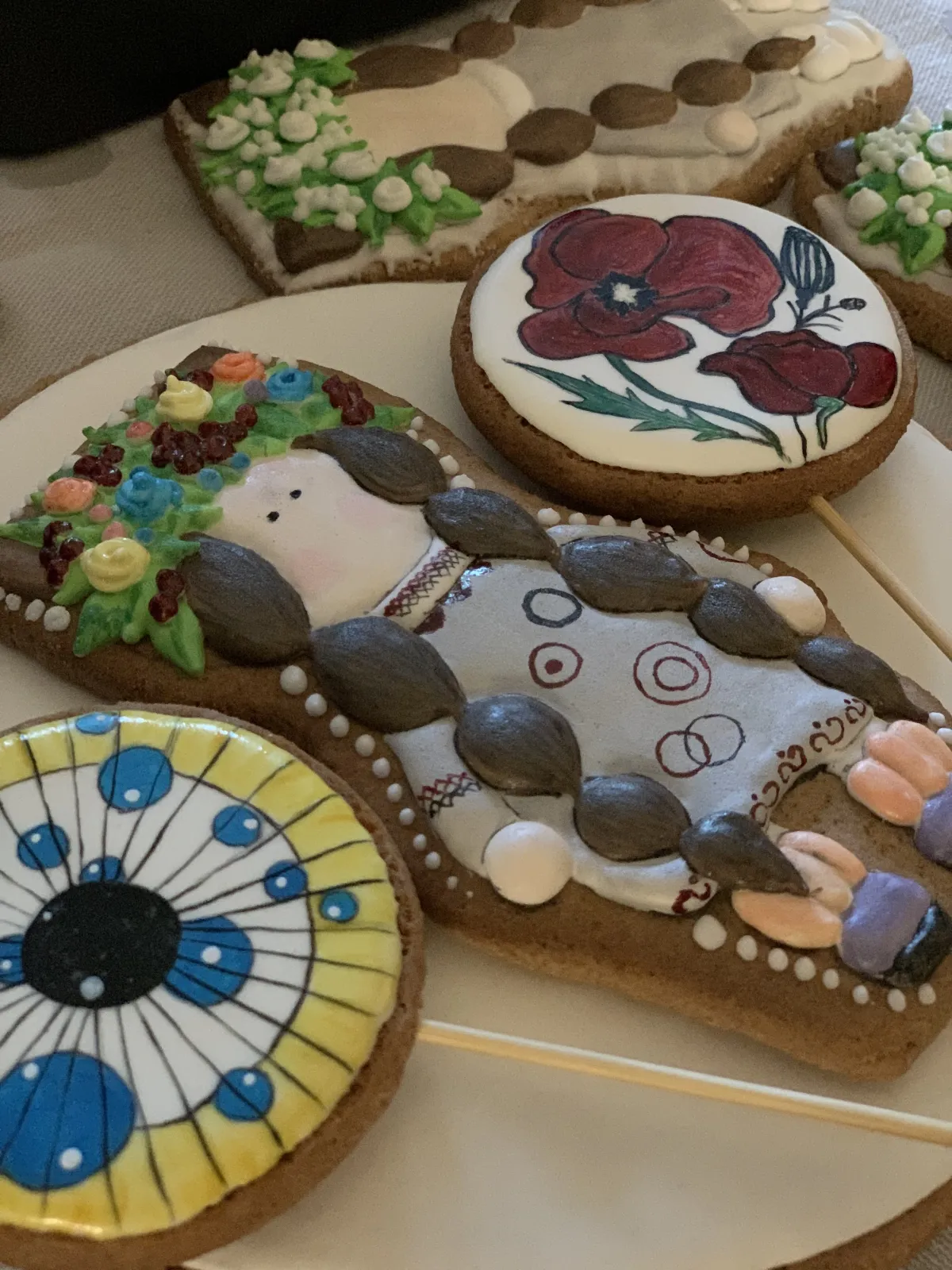 Set of hand-painted cookies with floral patterns