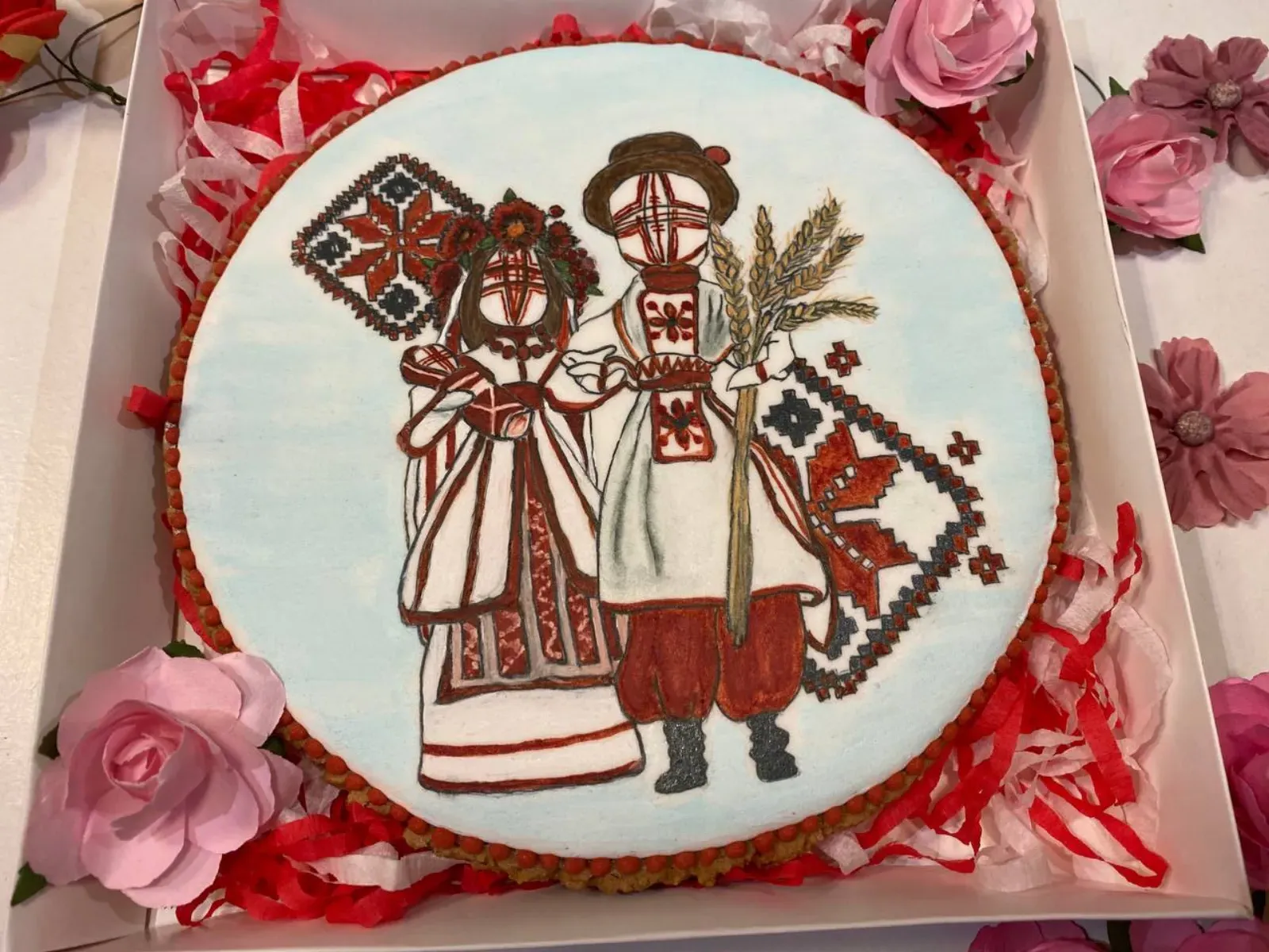 Cookie with Ukrainian couple in traditional dress