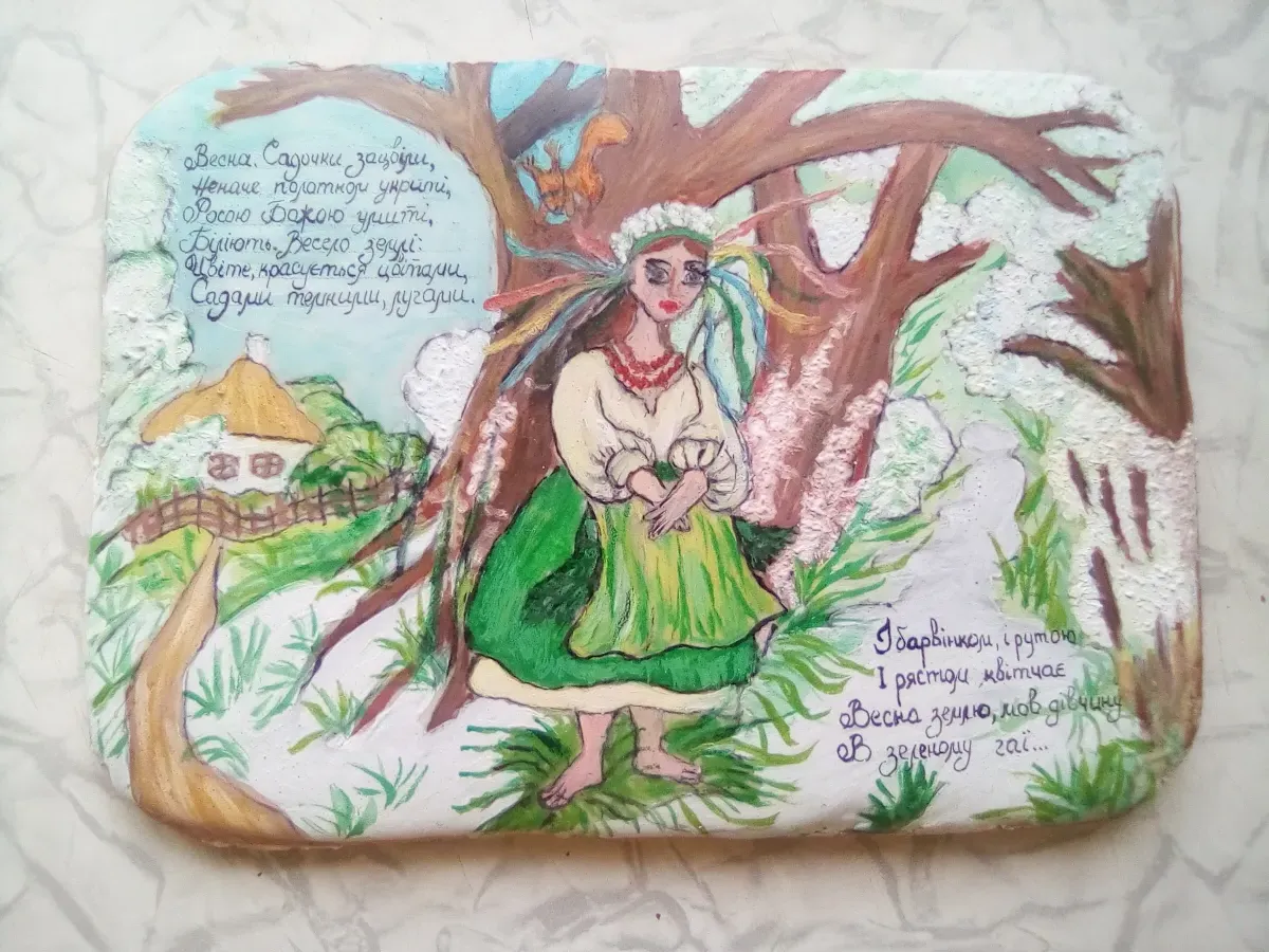 Hand-painted cookie with folk tale and birds