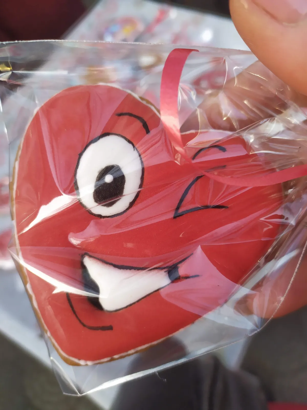 Hand-painted smiling heart cookie